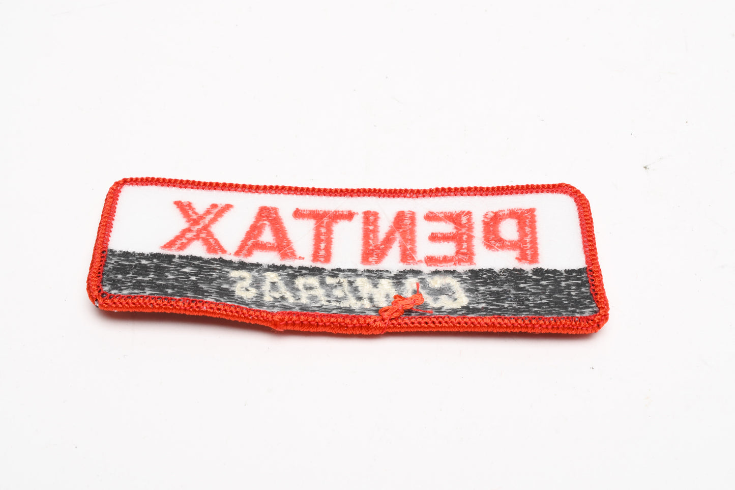 Pentax Cameras embroidered patch measures 38x95mm, New - Genuine