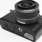 Nikon 1 V1 Mirrorless Camera w/Nikkor 10-30mm lens, UV, batt+charger, Mint-