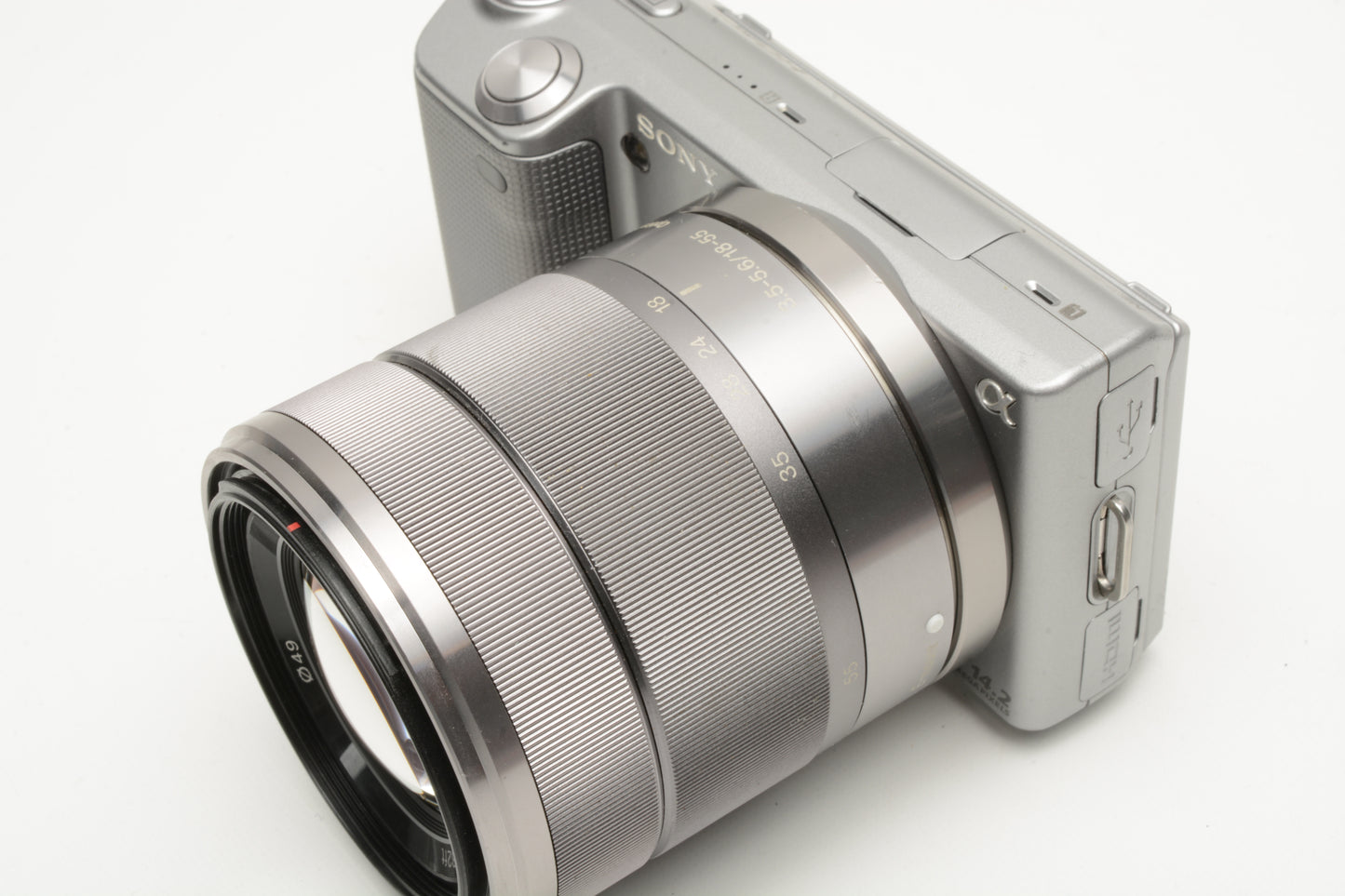 Sony NEX 5 Mirrorless w/18-55mm f3.5-5.6 zoom, 2batts, charger, flash, case