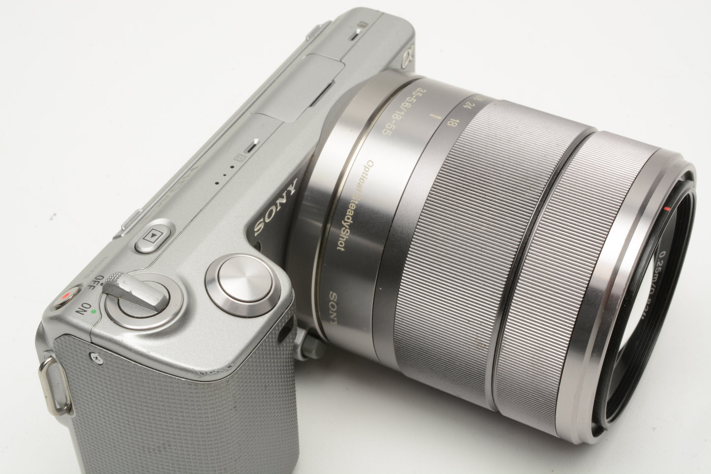 Sony NEX 5 Mirrorless w/18-55mm f3.5-5.6 zoom, 2batts, charger, flash, case