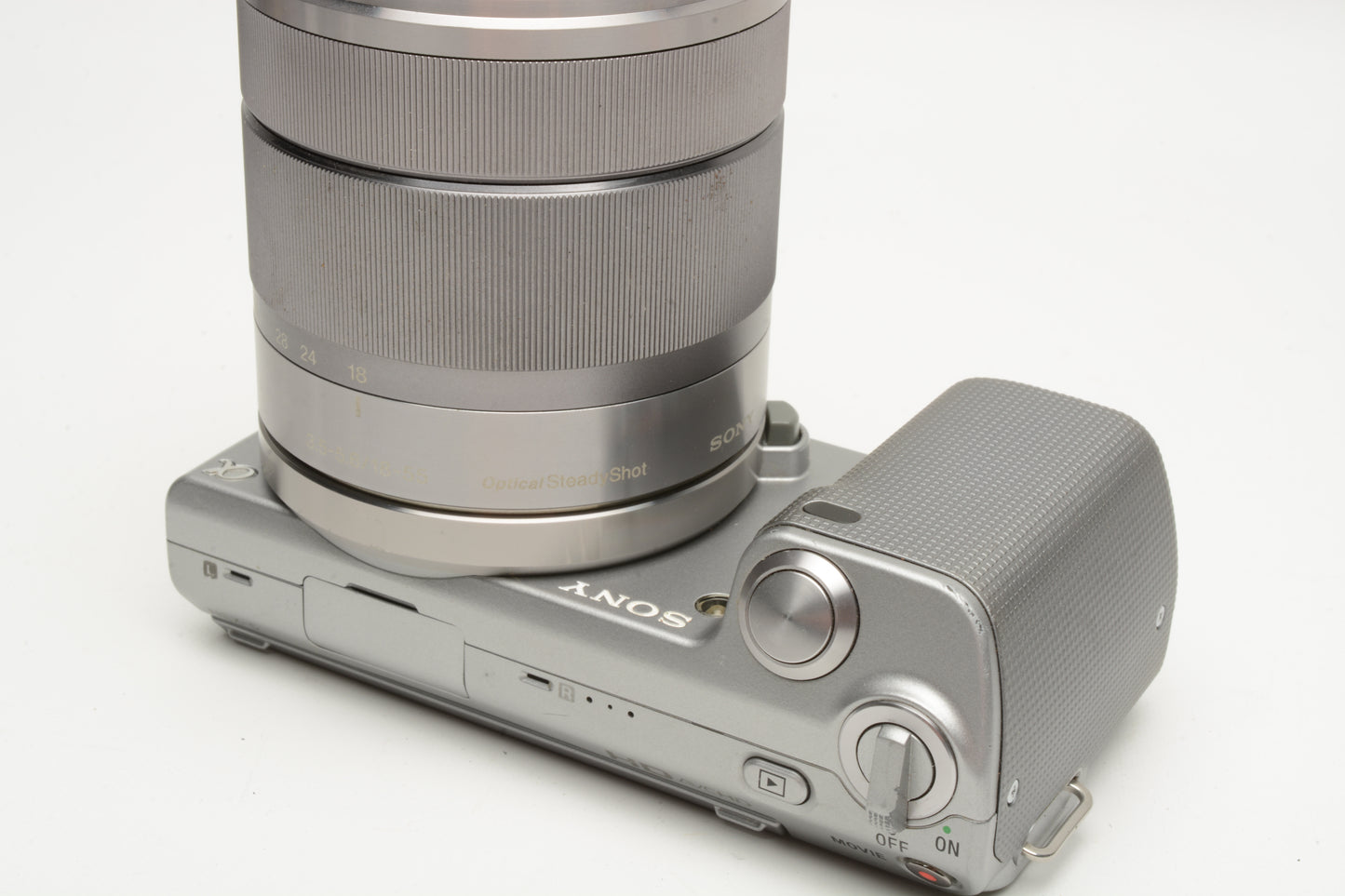 Sony NEX 5 Mirrorless w/18-55mm f3.5-5.6 zoom, 2batts, charger, flash, case