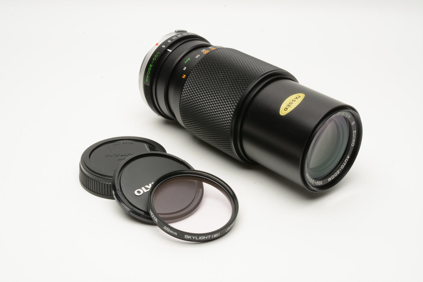 Olympus OM Zuiko 100-200mm f5 Telephoto zoom lens, Caps + UV