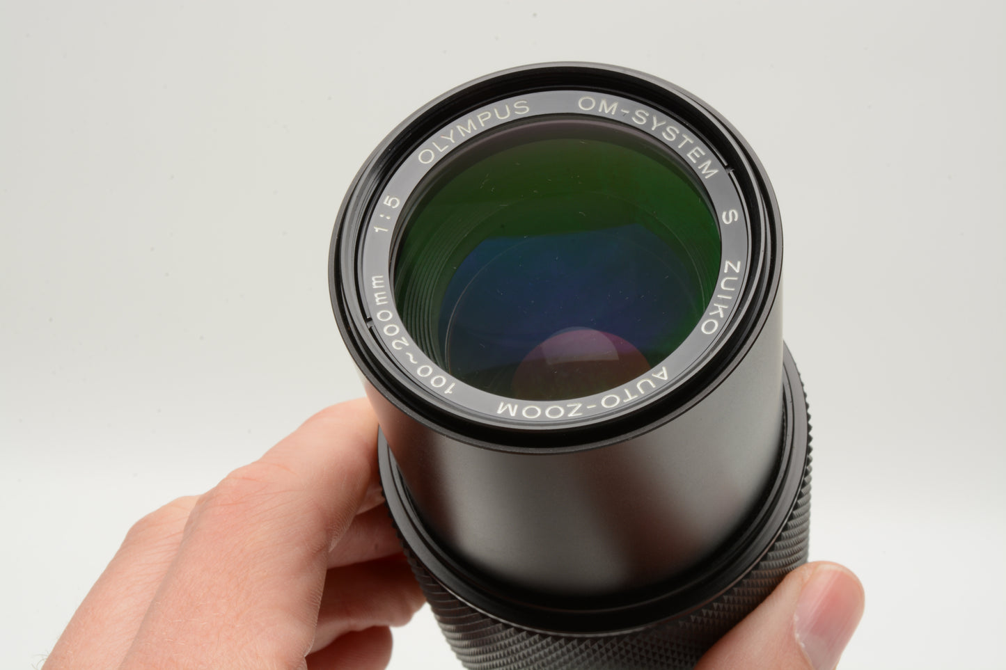 Olympus OM Zuiko 100-200mm f5 Telephoto zoom lens, Caps + UV