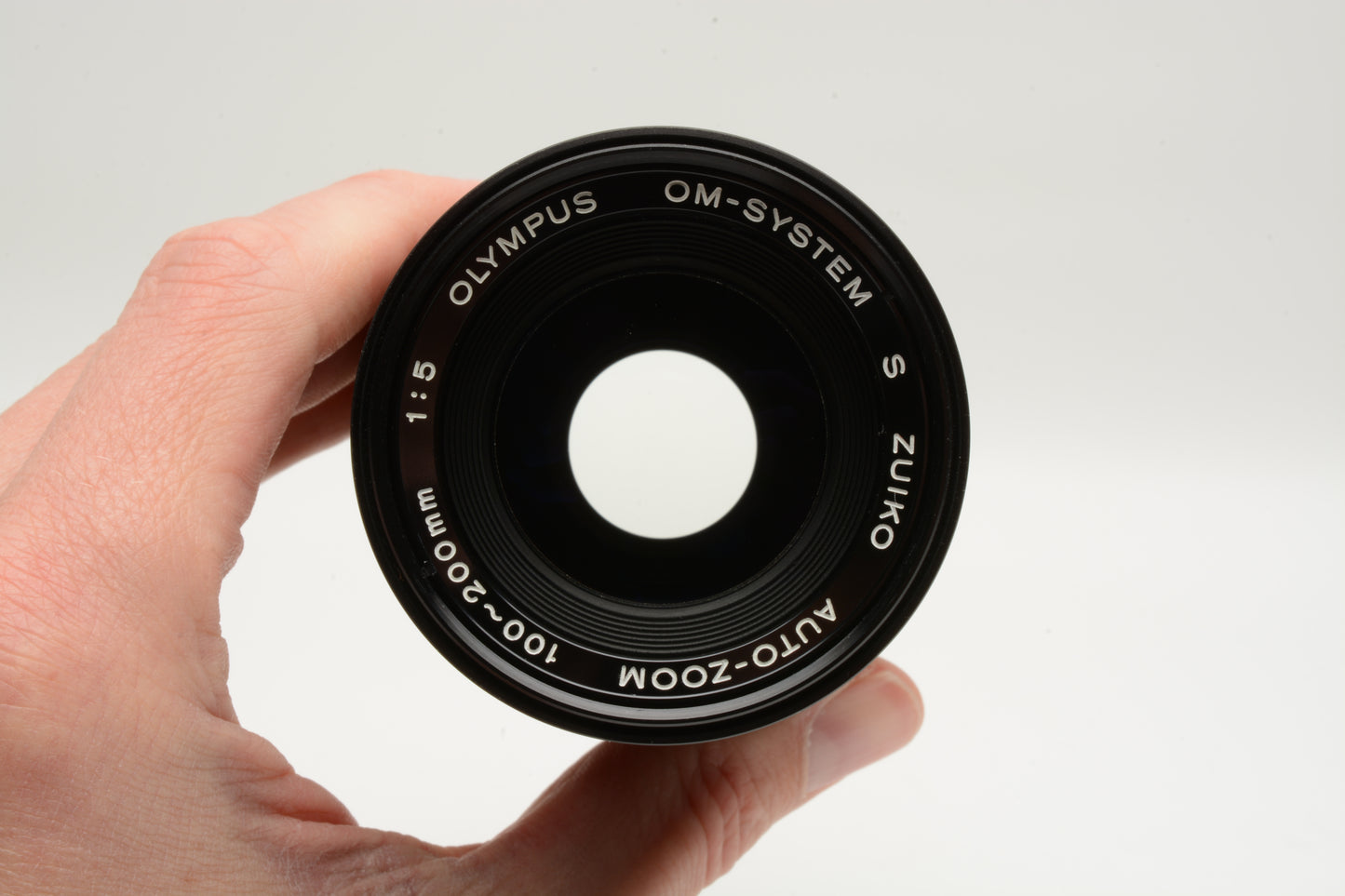 Olympus OM Zuiko 100-200mm f5 Telephoto zoom lens, Caps + UV