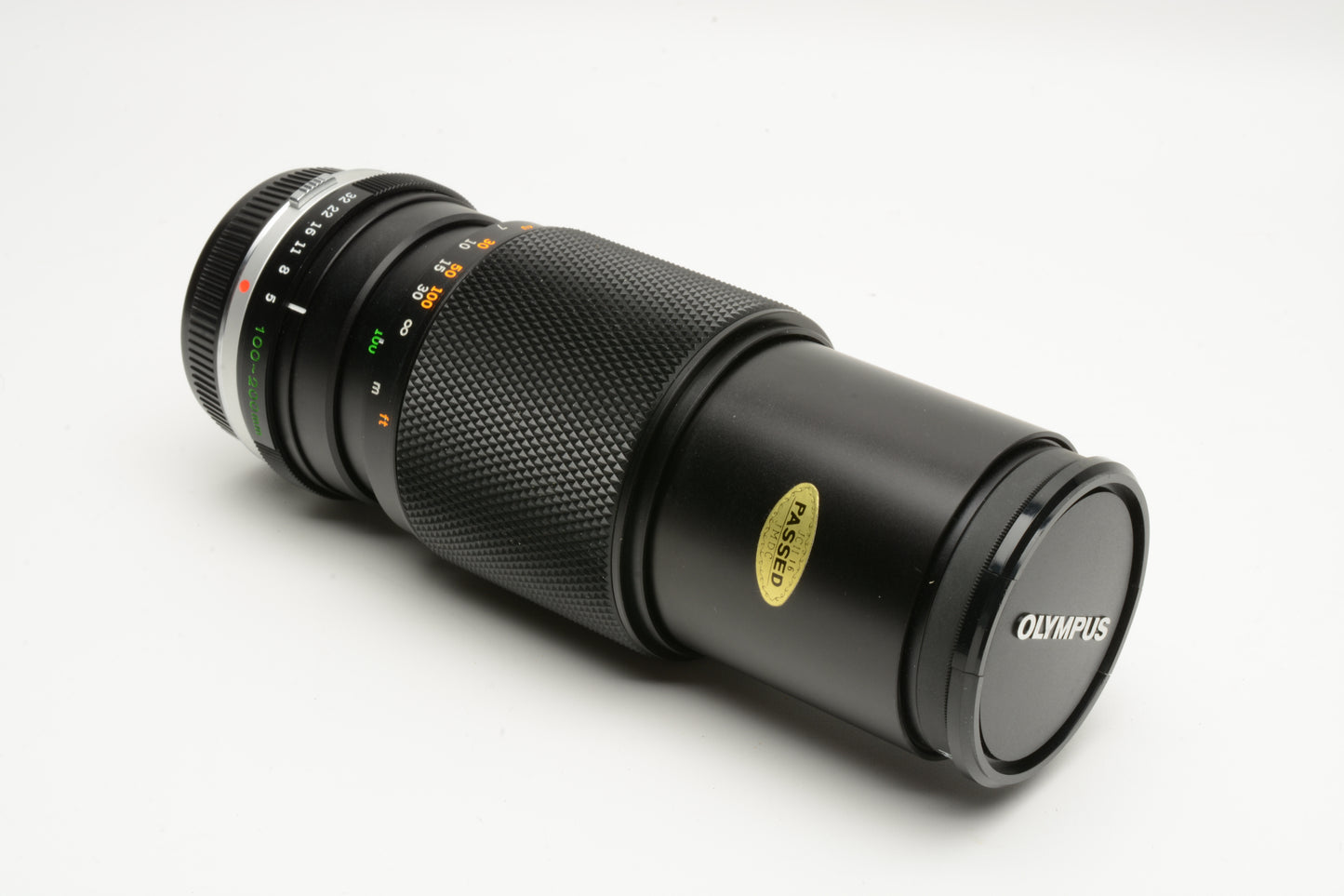 Olympus OM Zuiko 100-200mm f5 Telephoto zoom lens, Caps + UV