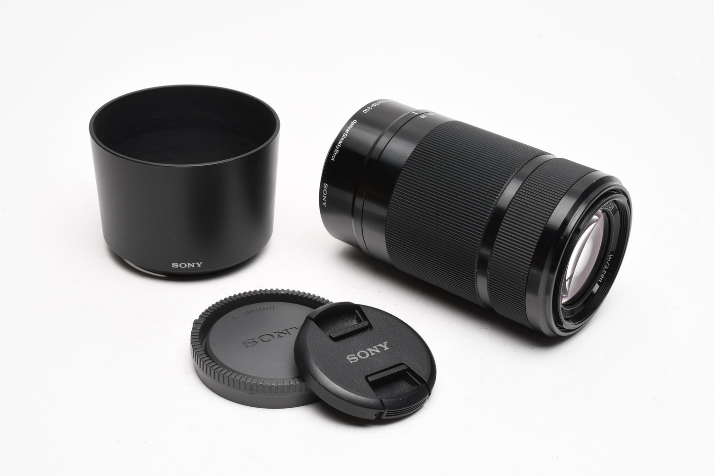 Sony 55-210mm f4.5-6.3 OSS zoom lens (Black) w/Lens caps, Lens hood