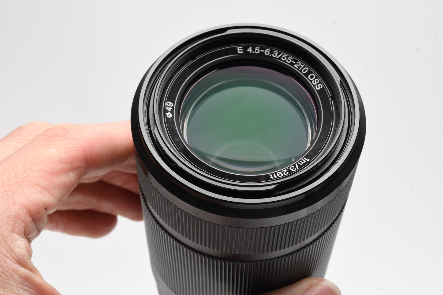 Sony 55-210mm f4.5-6.3 OSS zoom lens (Black) w/Lens caps, Lens hood