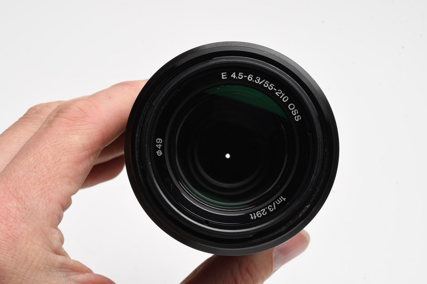 Sony 55-210mm f4.5-6.3 OSS zoom lens (Black) w/Lens caps, Lens hood