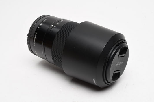 Sony 55-210mm f4.5-6.3 OSS zoom lens (Black) w/Lens caps, Lens hood