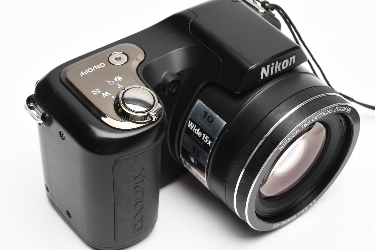 Nikon Coolpix L100 10MP Digital Point&Shoot camera, strap+manual, Great!