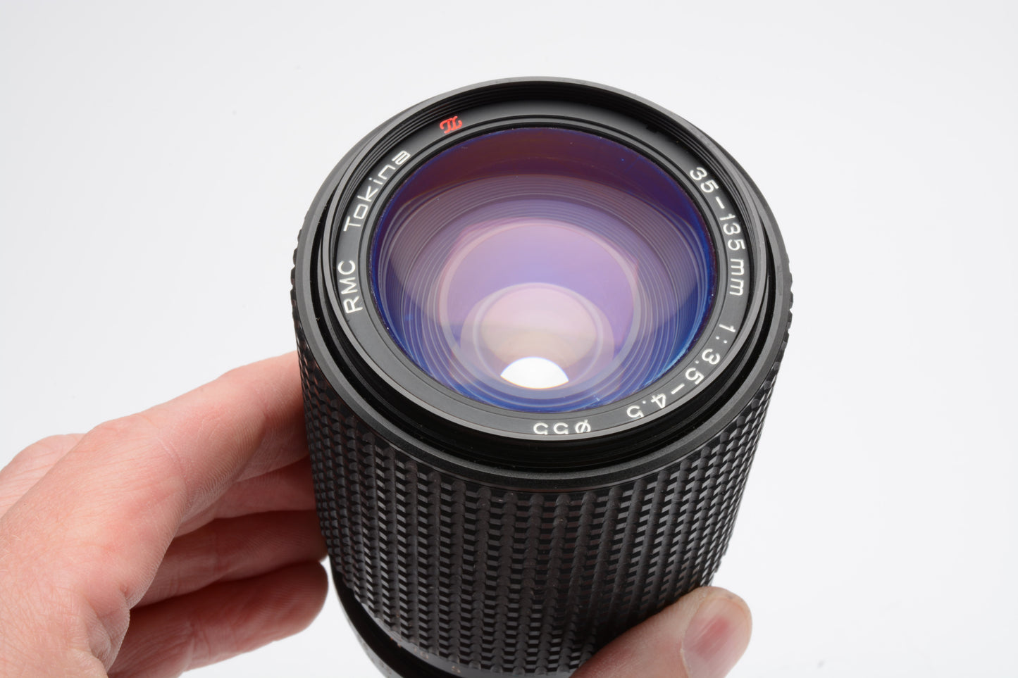 Tokina 35-135mm f3.5-4.5 zoom lens for Nikon F Ai-S Mount, caps + UV