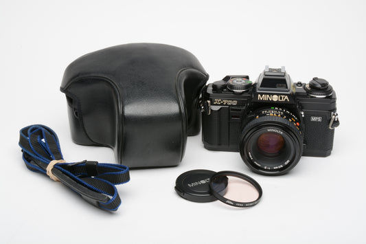 Minolta X700 35mm SLR w/50mm f2 lens, strap, cap, UV, case, new seals, nice!