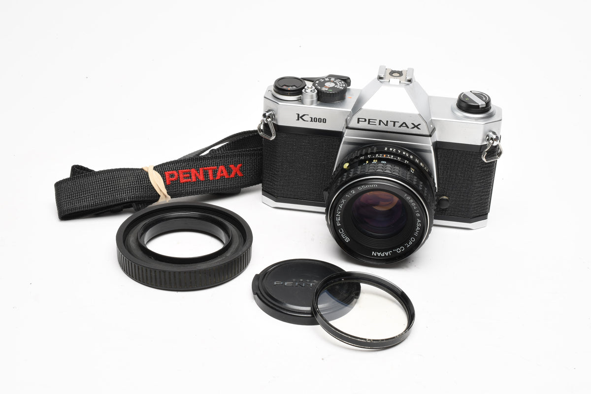 Pentax K1000 35mm SLR w/55mm f2 SMC lens, New seals, strap, Mint-