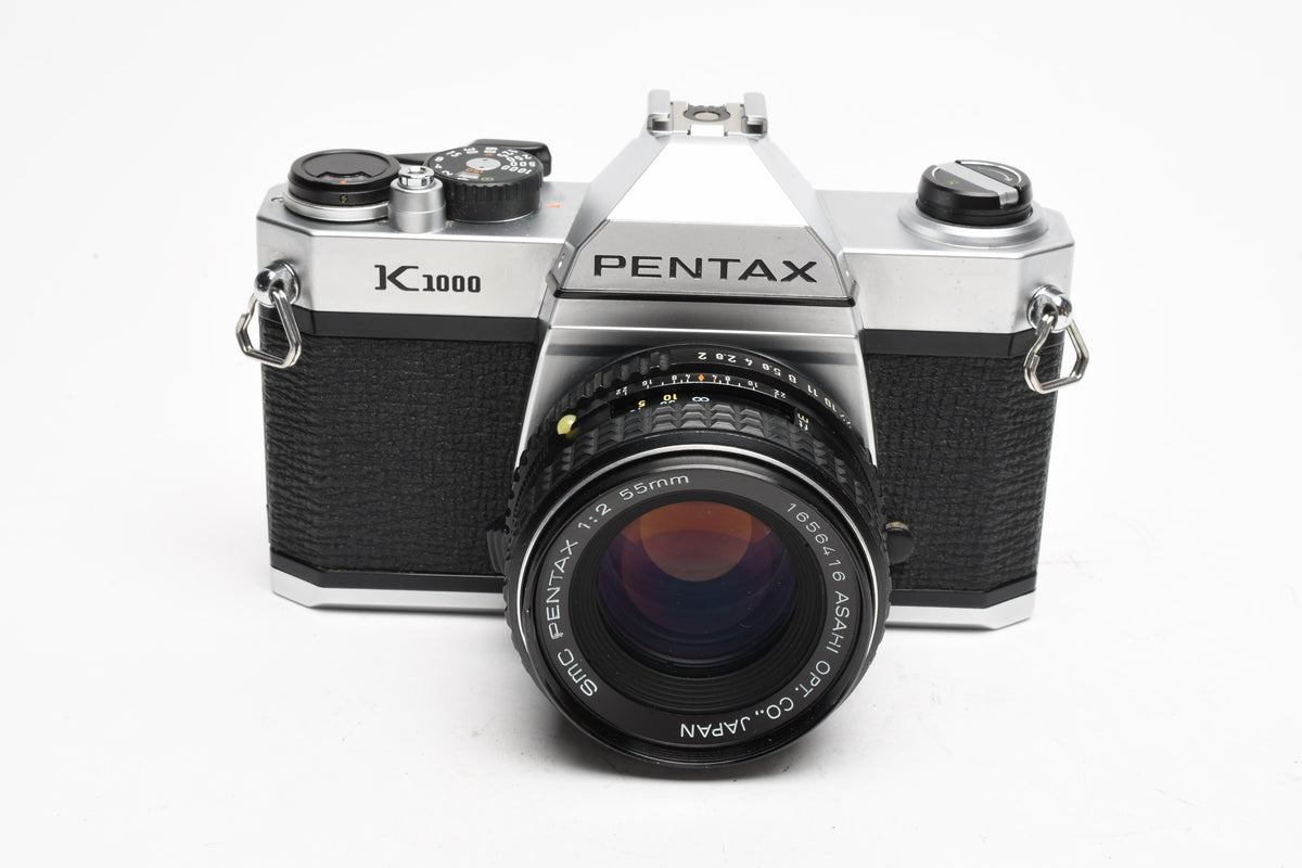 Pentax K1000 35mm SLR w/55mm f2 SMC lens, New seals, strap, Mint-
