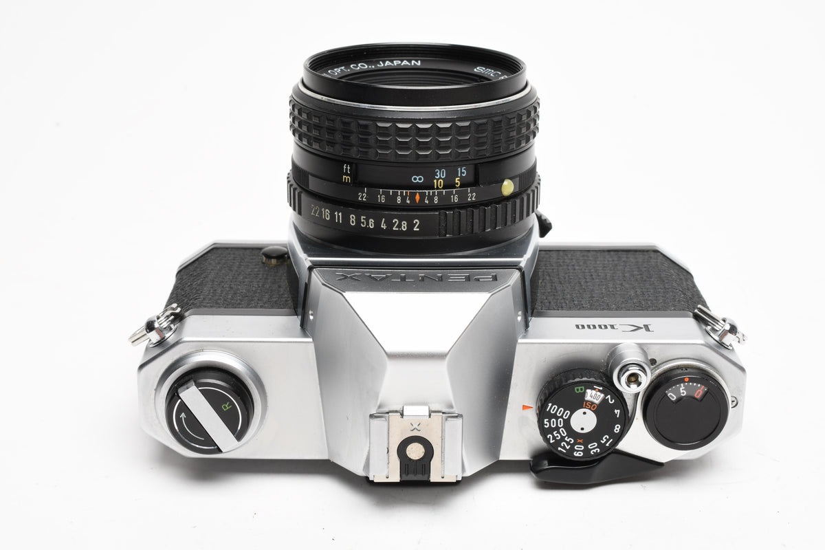 Pentax K1000 35mm SLR w/55mm f2 SMC lens, New seals, strap, Mint-