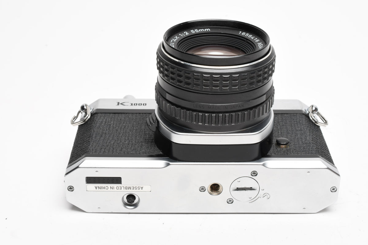 Pentax K1000 35mm SLR w/55mm f2 SMC lens, New seals, strap, Mint-