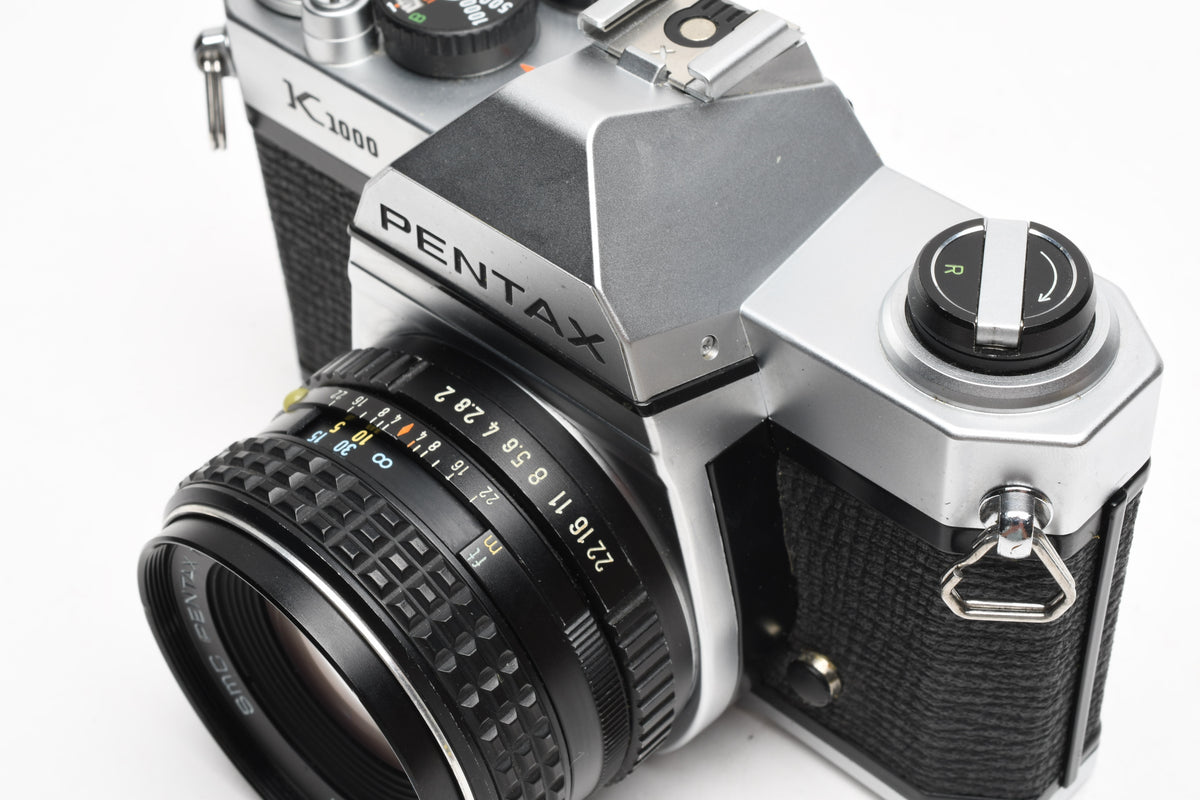 Pentax K1000 35mm SLR w/55mm f2 SMC lens, New seals, strap, Mint-