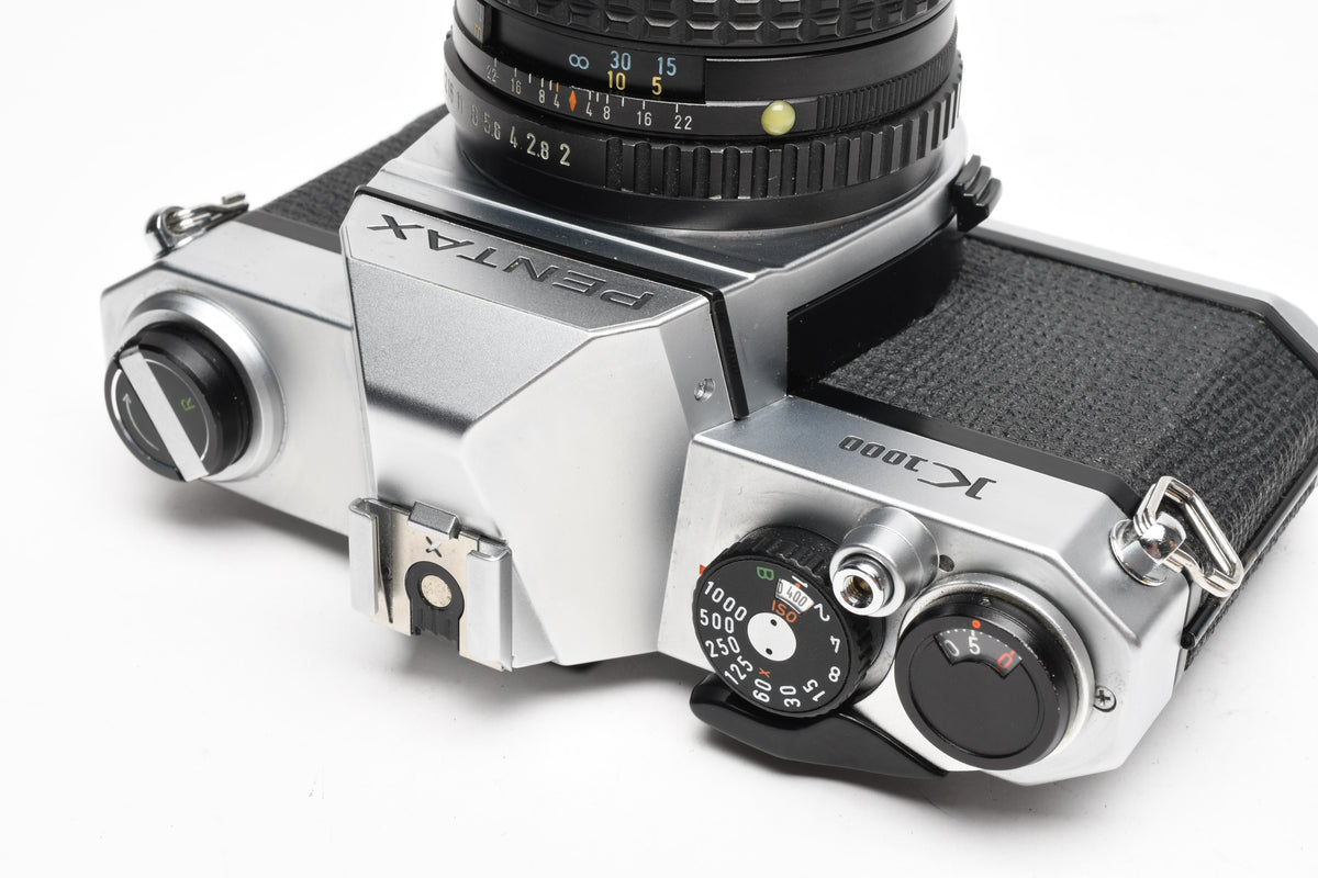 Pentax K1000 35mm SLR w/55mm f2 SMC lens, New seals, strap, Mint-