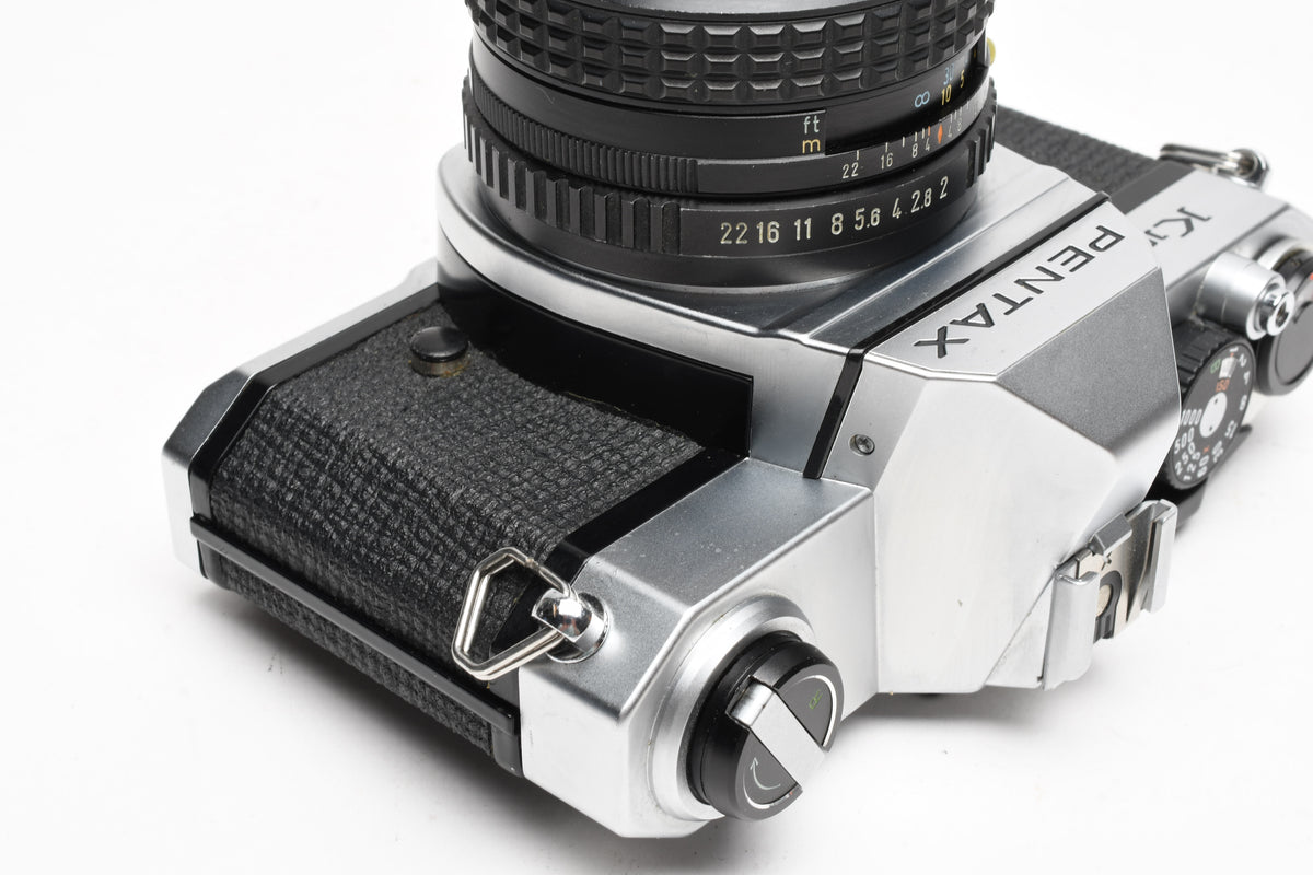 Pentax K1000 35mm SLR w/55mm f2 SMC lens, New seals, strap, Mint-