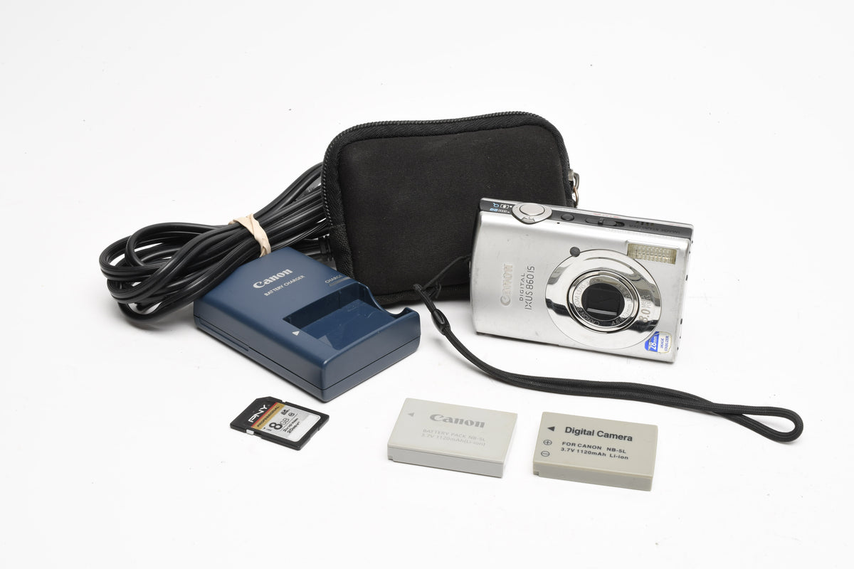 Canon IXUS 860 IS 8MP Digital Point&Shoot w/2X batts+charger+case++