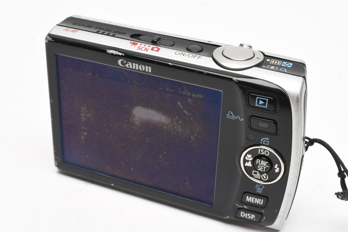 Canon IXUS 860 IS 8MP Digital Point&Shoot w/2X batts+charger+case++