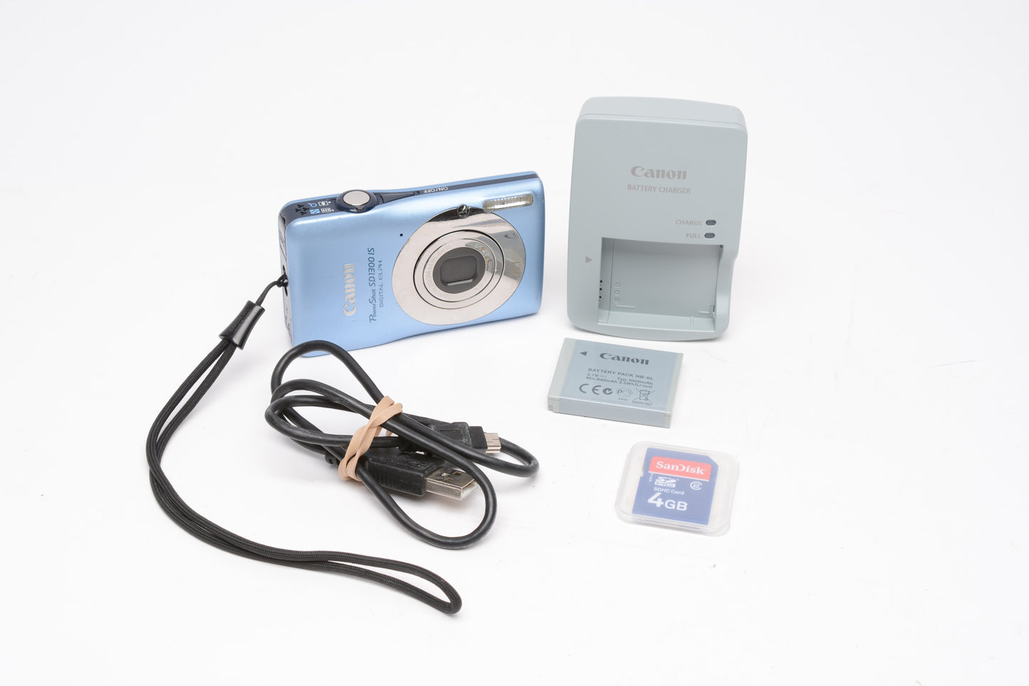 Canon PowerShot SD1300 IS Digital Elph Point & Shoot Camera w/ batt, charger, SD