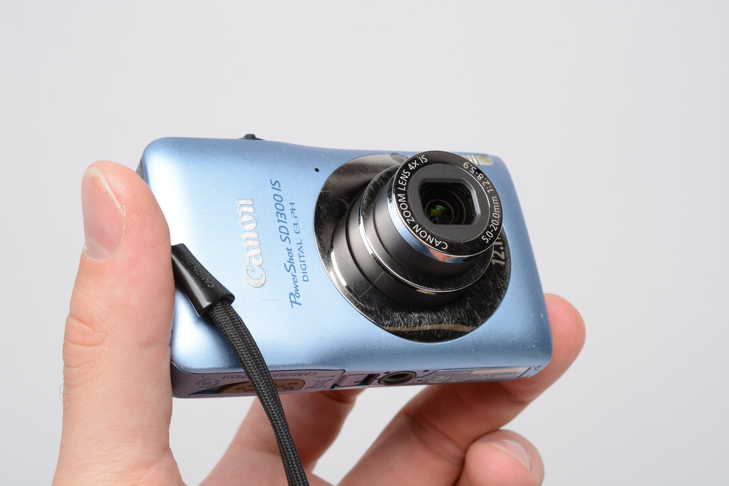 Canon PowerShot SD1300 IS Digital Elph Point & Shoot Camera w/ batt, charger, SD
