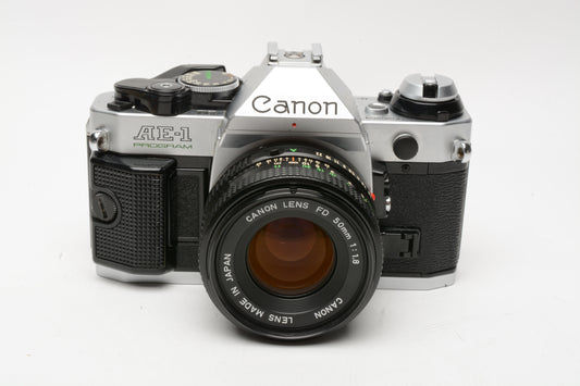 Canon AE-1 Program 35mm SLR Camera w/50mm f1.8, New Seals, Manuals, Accurate