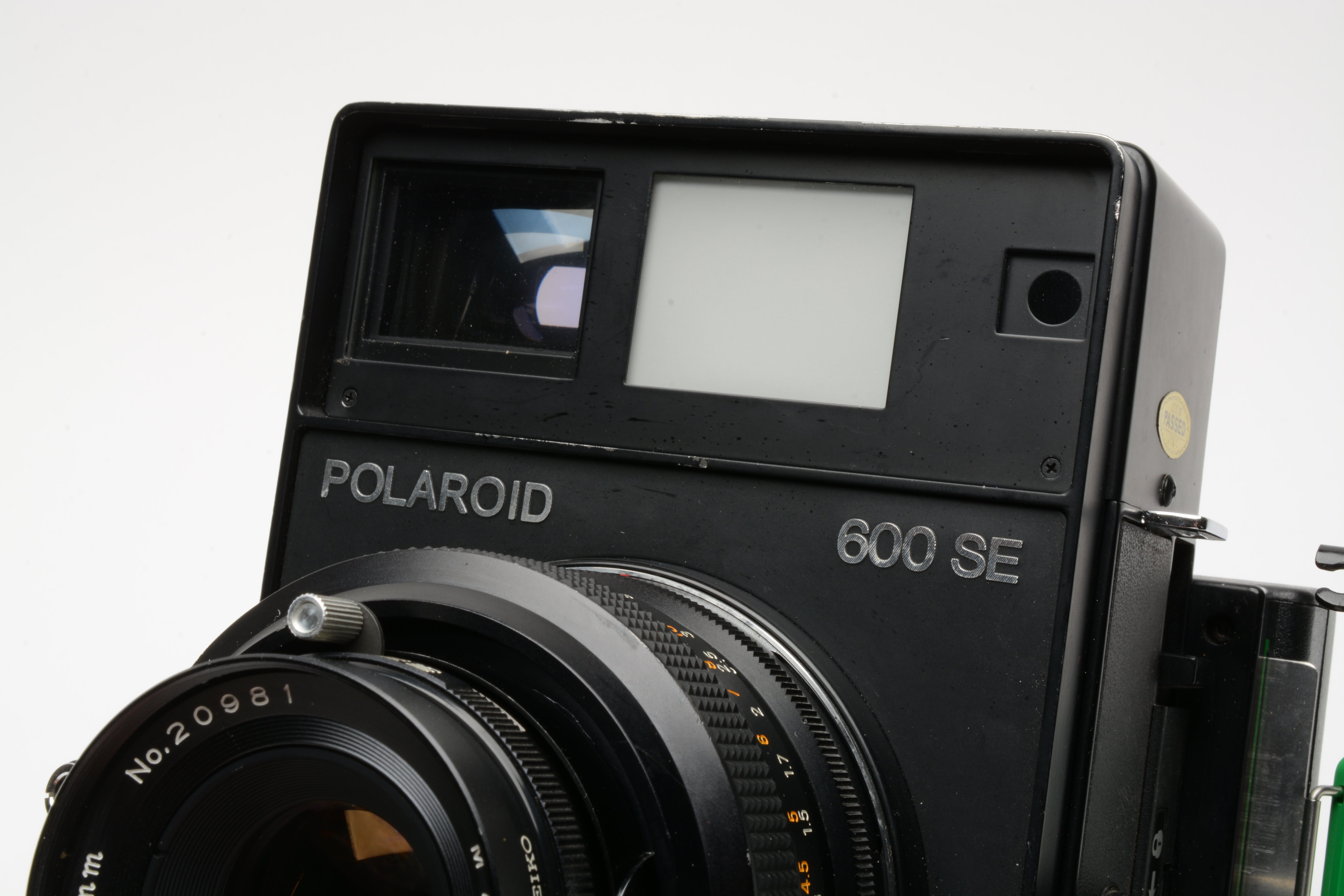 Polaroid 600SE Instant Camera w/Mamiya 127mm F4.7, New seals