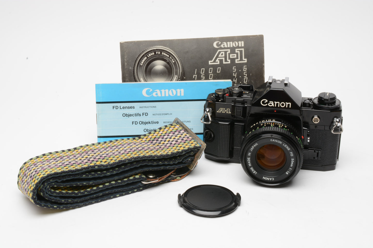 Canon A-1 35mm SLR Body w/50mm f1.8 Canon FD Lens + Cap, Strap, Manuals, Full Seals!