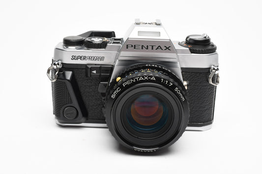 Pentax Super Program 35mm SLR w/50mm F1.7 lens, strap, tested Great!