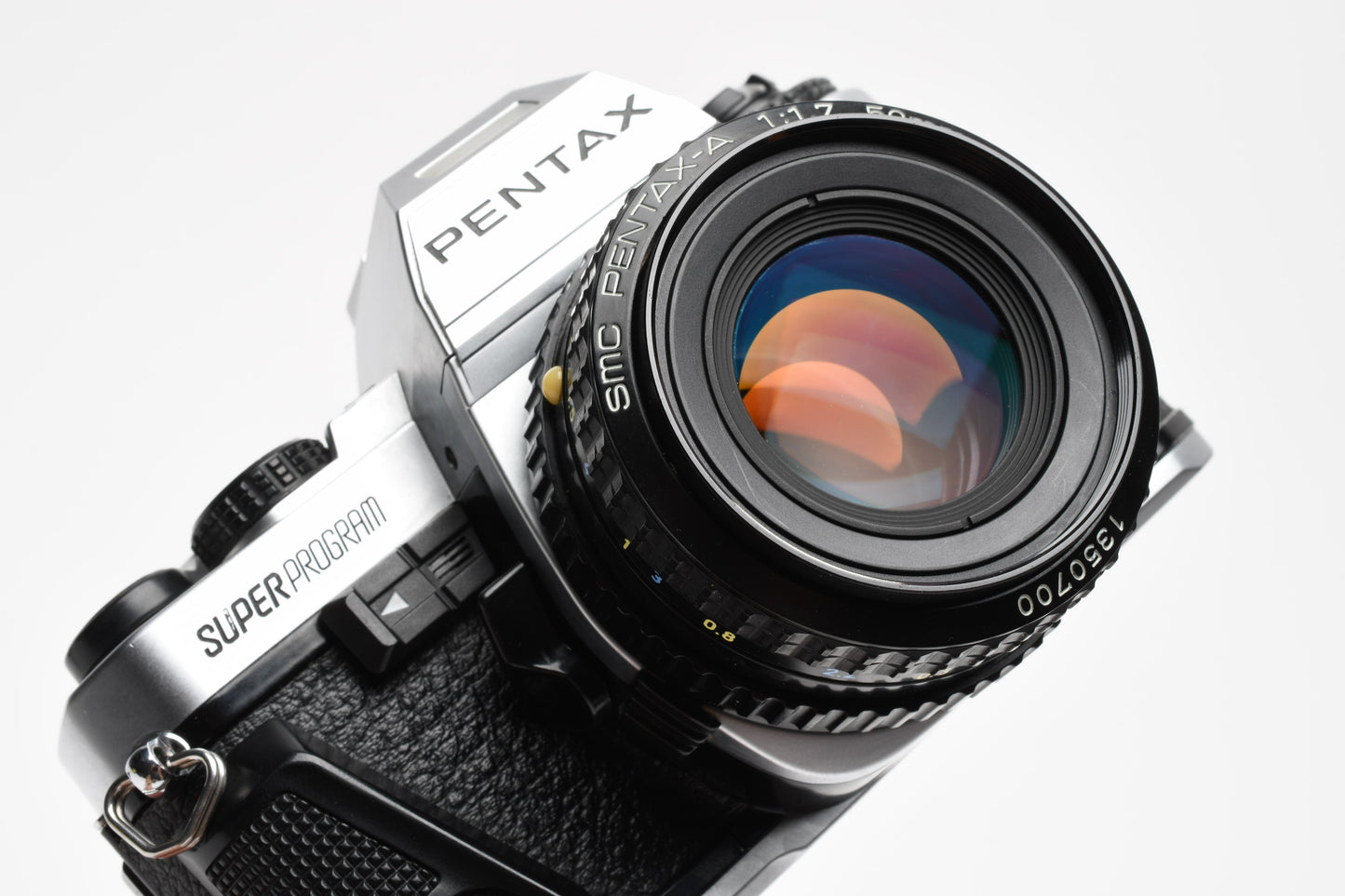 Pentax Super Program 35mm SLR w/50mm F1.7 lens, strap, tested Great!