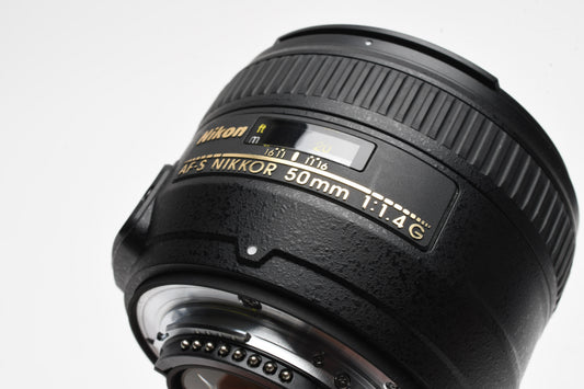Nikon AF Nikkor 50mm f1.4G prime lens, nice prime lens w/caps