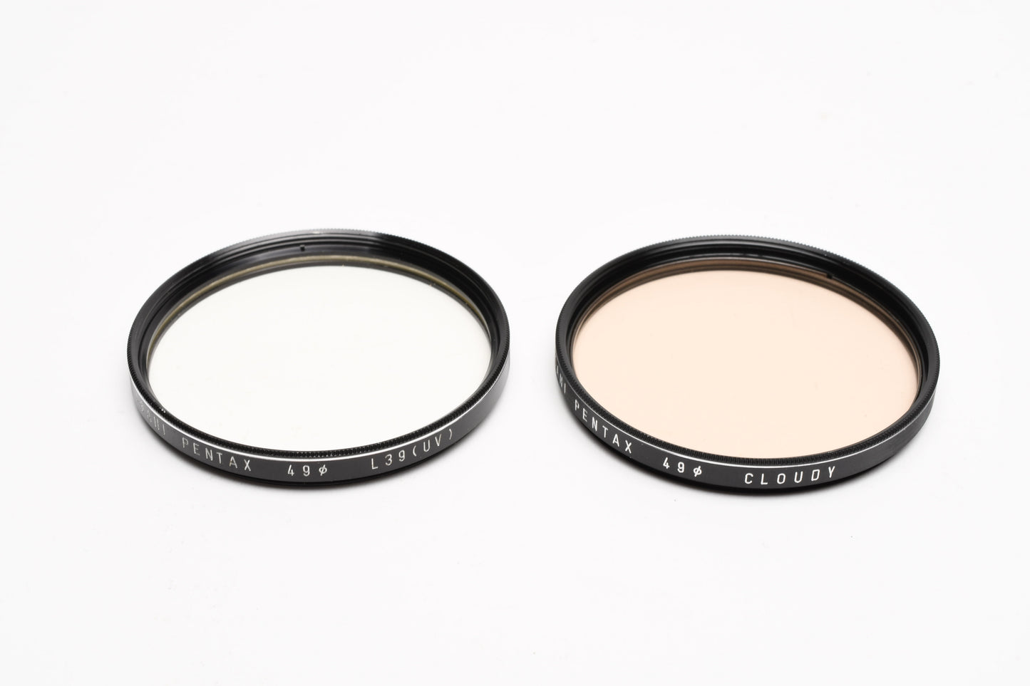 Pentax set of 2 49mm filters:  L39 UV and Cloudy, in case