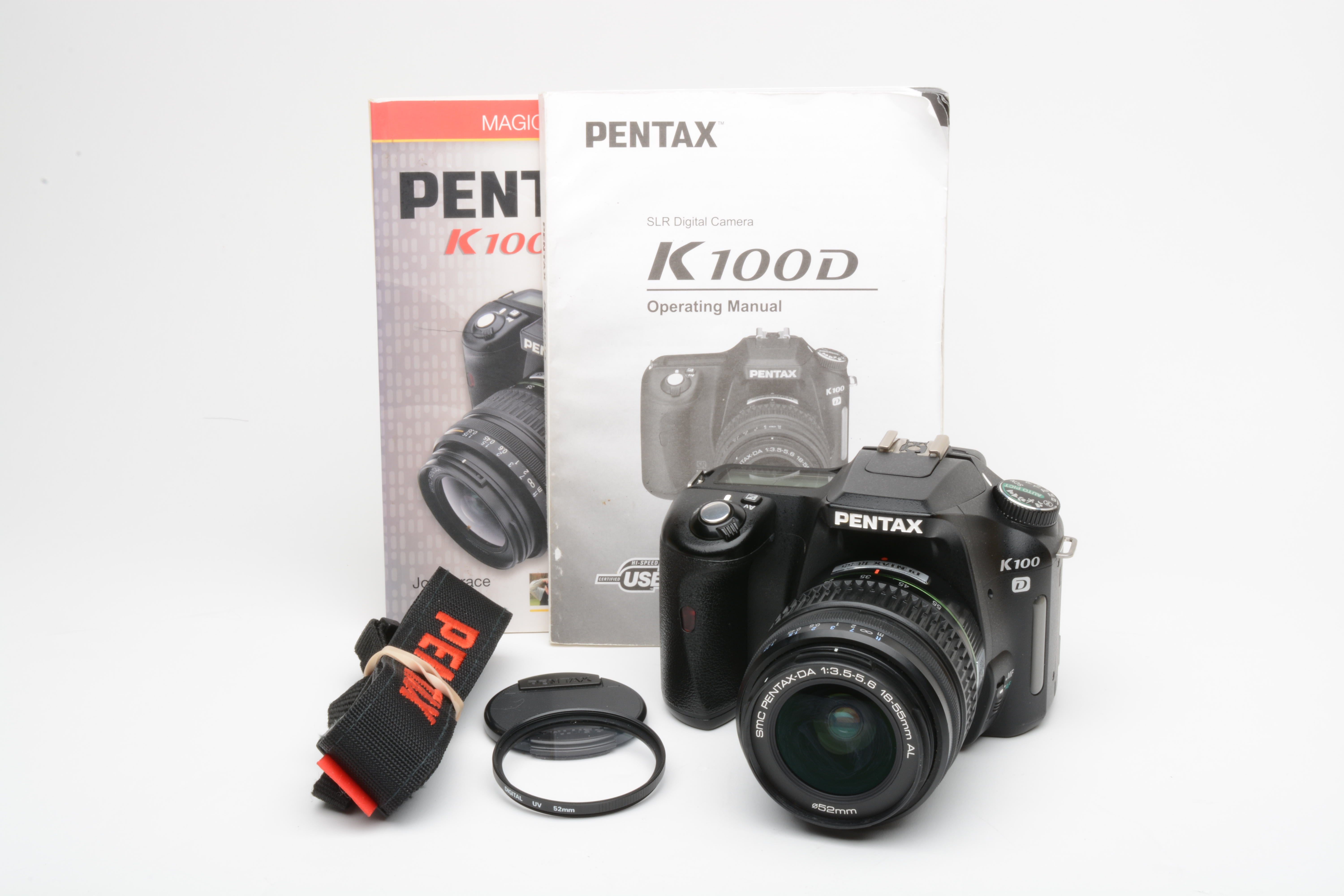 Pentax K100D DSLR w/18-55mm f3.5-5.6 zoom, manuals, book, strap, cap, UV,  Clean!