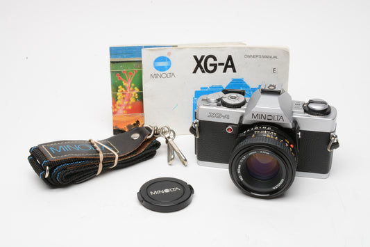 Minolta XG-A 35mm SLR w/50mm f1.7 lens, strap, new seals, cap, manuals