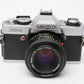 Minolta XG-A 35mm SLR w/50mm f1.7 lens, strap, new seals, cap, manuals