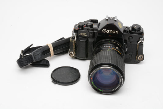 Canon A-1 35mm SLR Body w/Tokina 35-105mm f3.5-4.3 zoom, Strap, New Seals