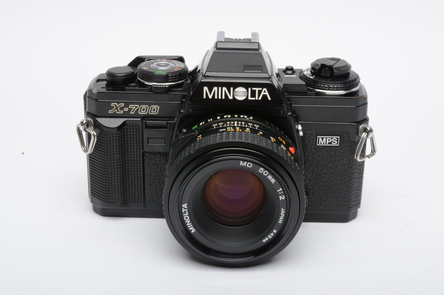 Minolta X700 35mm SLR w/50mm f2 lens, strap, cap, new seals, UV, Nice