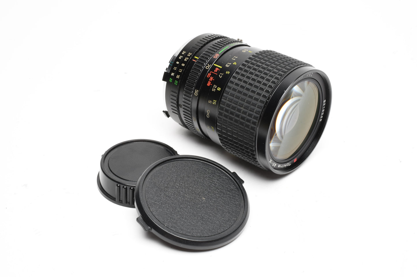 Tokina AT-X 28-85mm f3.5-4.5 zoom lens for Minolta MD w/Caps, Good!