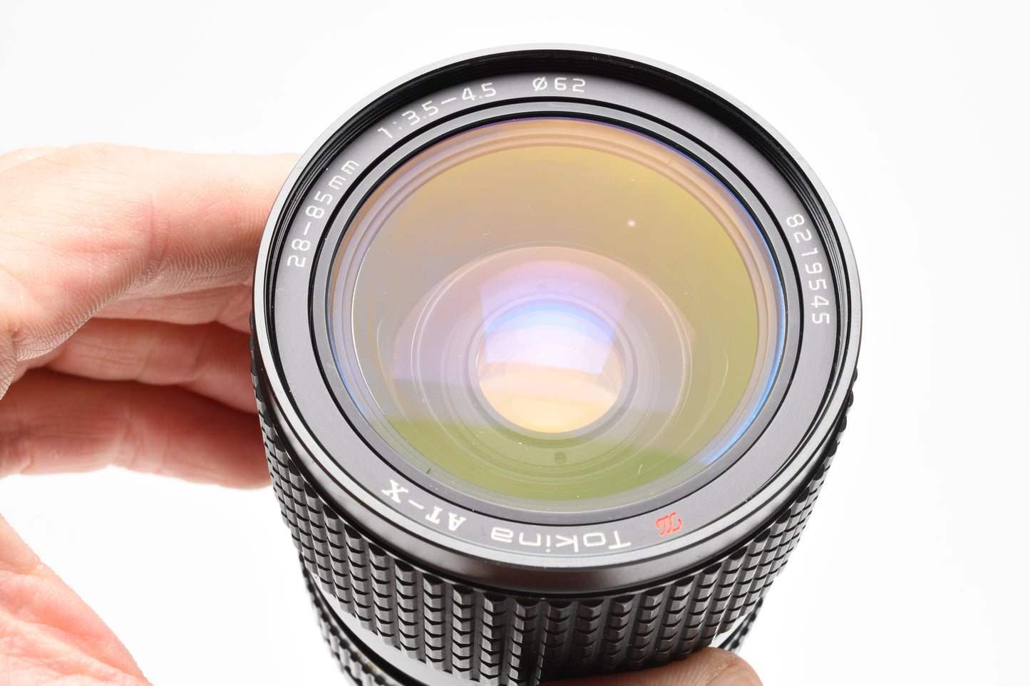 Tokina AT-X 28-85mm f3.5-4.5 zoom lens for Minolta MD w/Caps, Good!