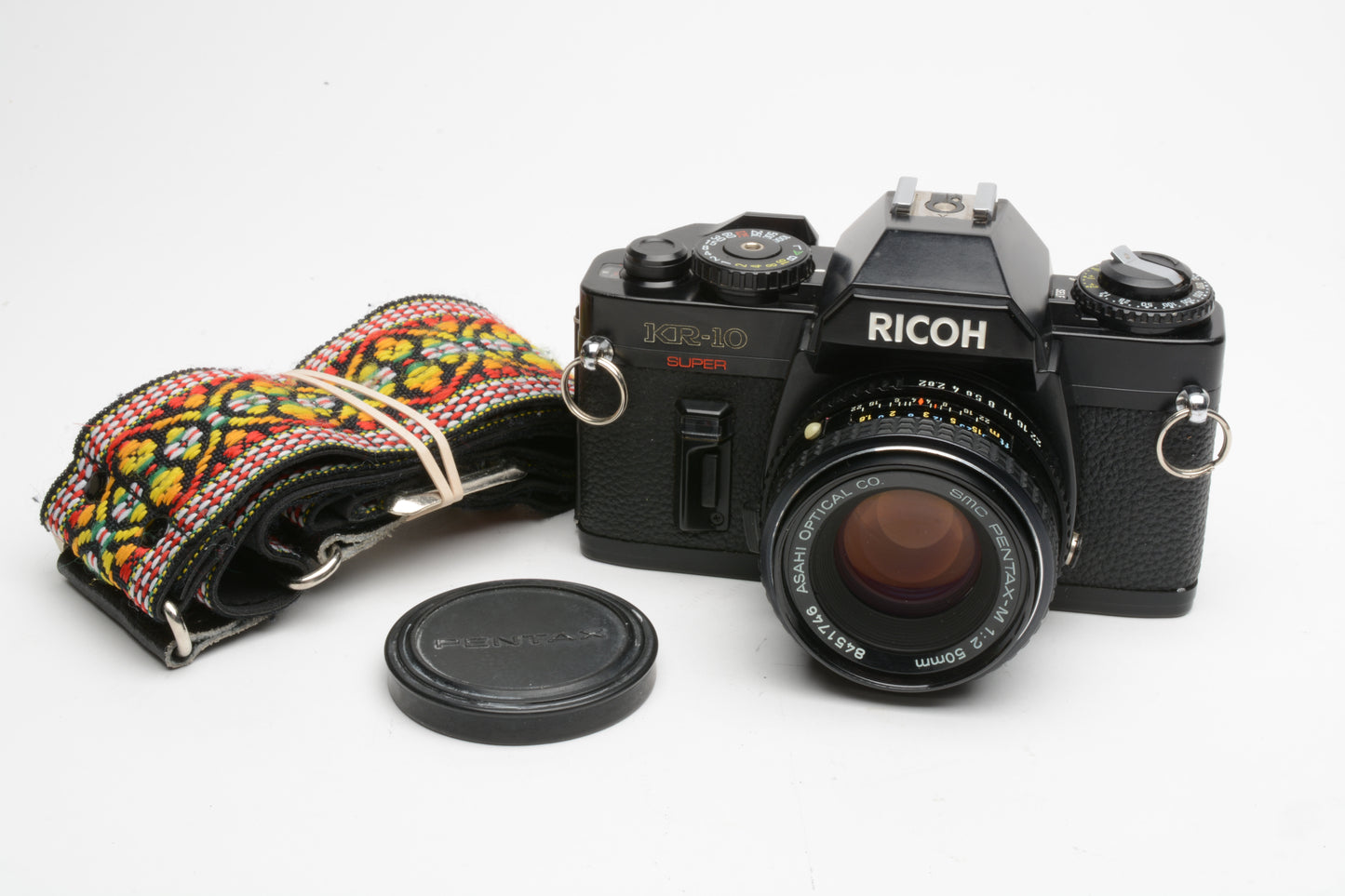 Ricoh KR-10 Super 35mm SLR w/50mm f2 Prime lens, cap, New seals, Strap, Nice