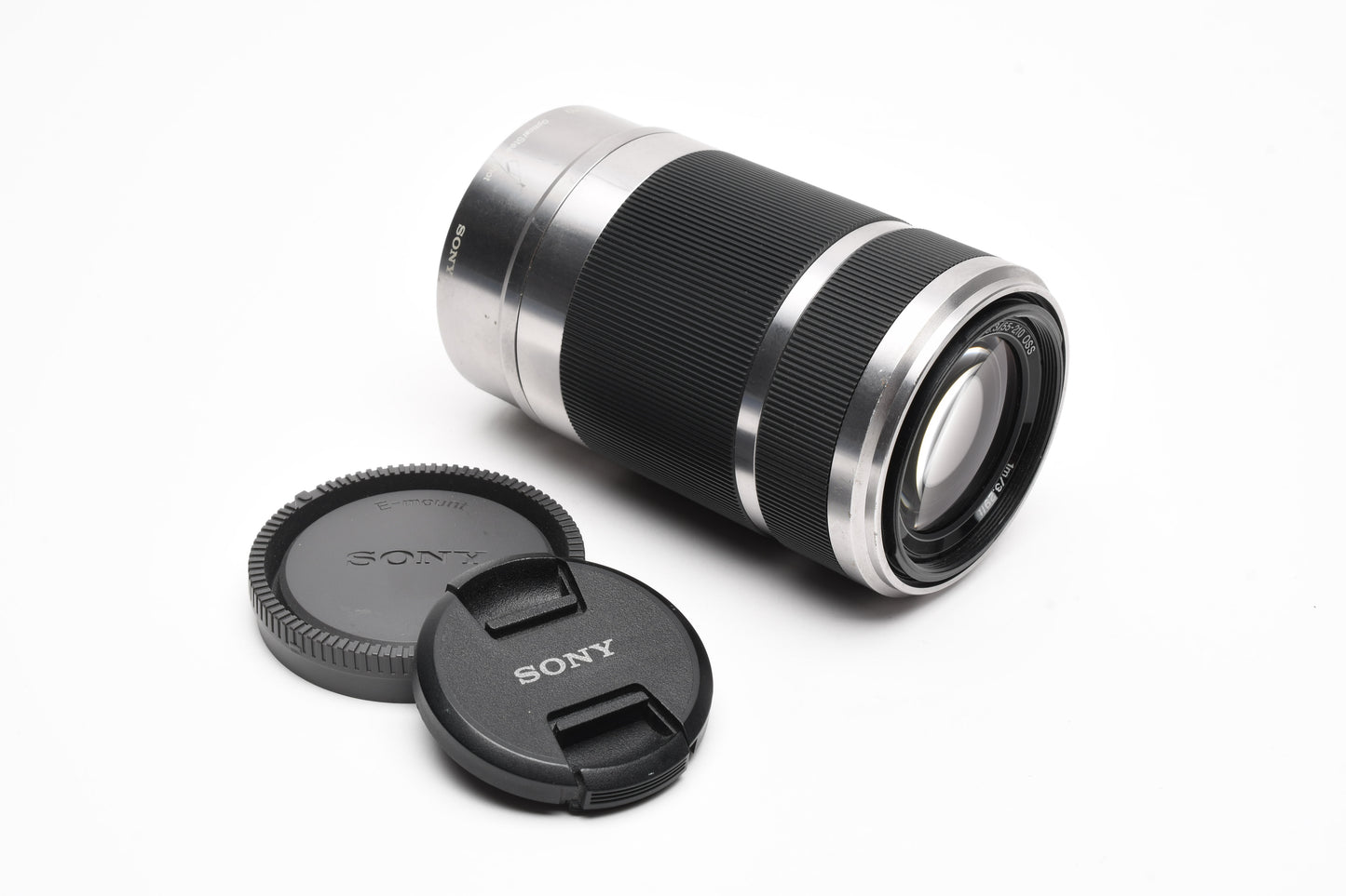 Sony 55-210mm f4.5-6.3 OSS zoom lens (Silver) w/Lens caps, Good!