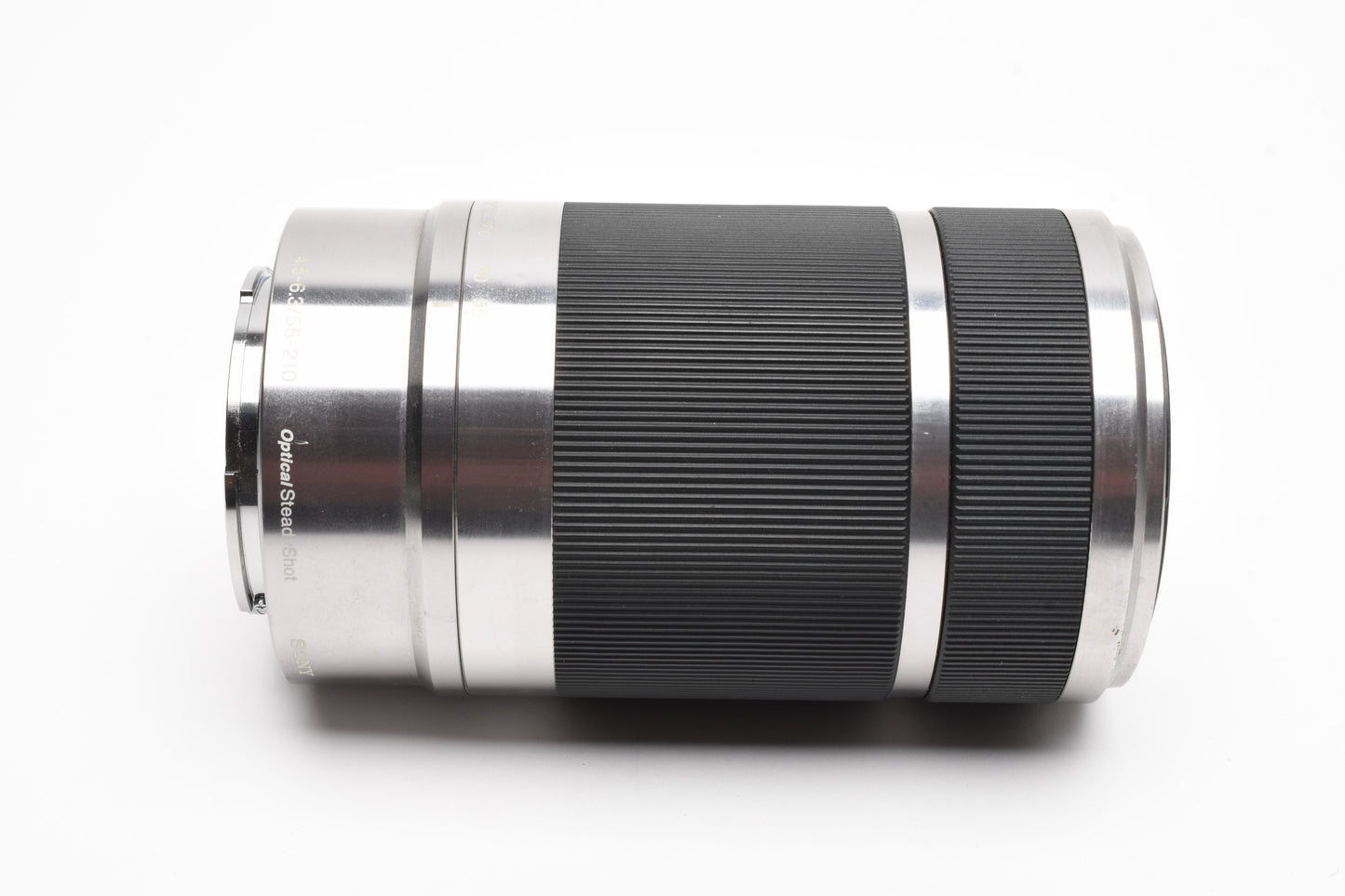 Sony 55-210mm f4.5-6.3 OSS zoom lens (Silver) w/Lens caps, Good!