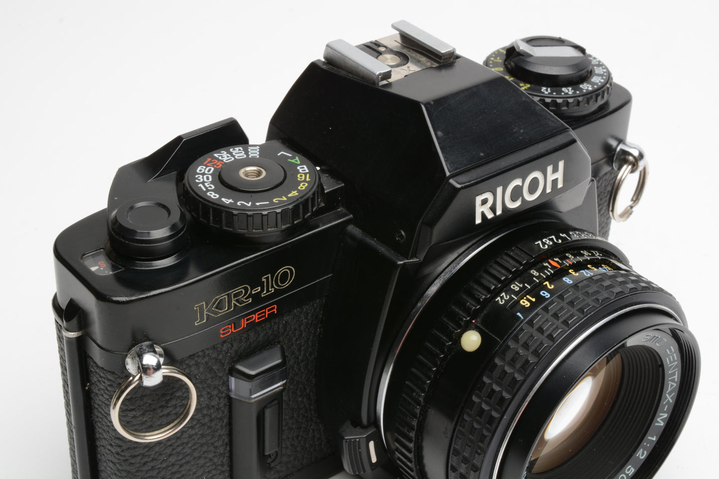 Ricoh KR-10 Super 35mm SLR w/50mm f2 Prime lens, cap, New seals, Strap, Nice