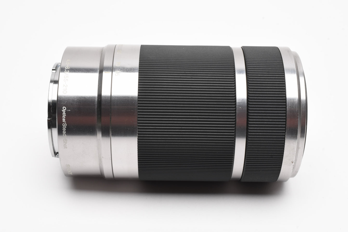 Sony 55-210mm f4.5-6.3 OSS zoom lens (Silver) w/Lens caps, Good!