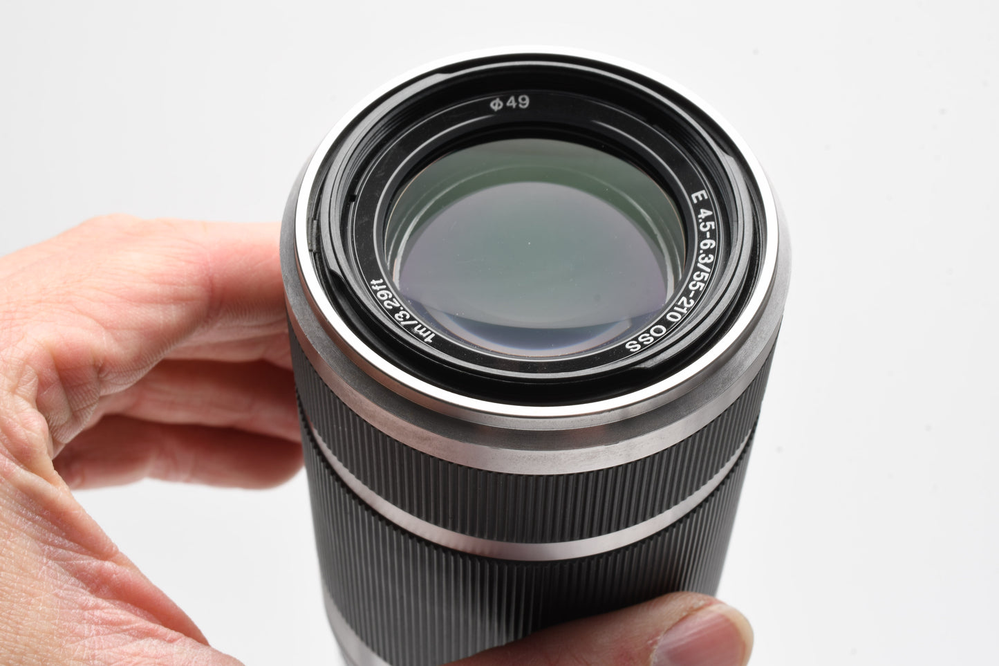 Sony 55-210mm f4.5-6.3 OSS zoom lens (Silver) w/Lens caps, Good!