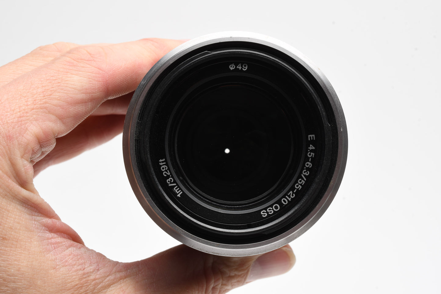 Sony 55-210mm f4.5-6.3 OSS zoom lens (Silver) w/Lens caps, Good!
