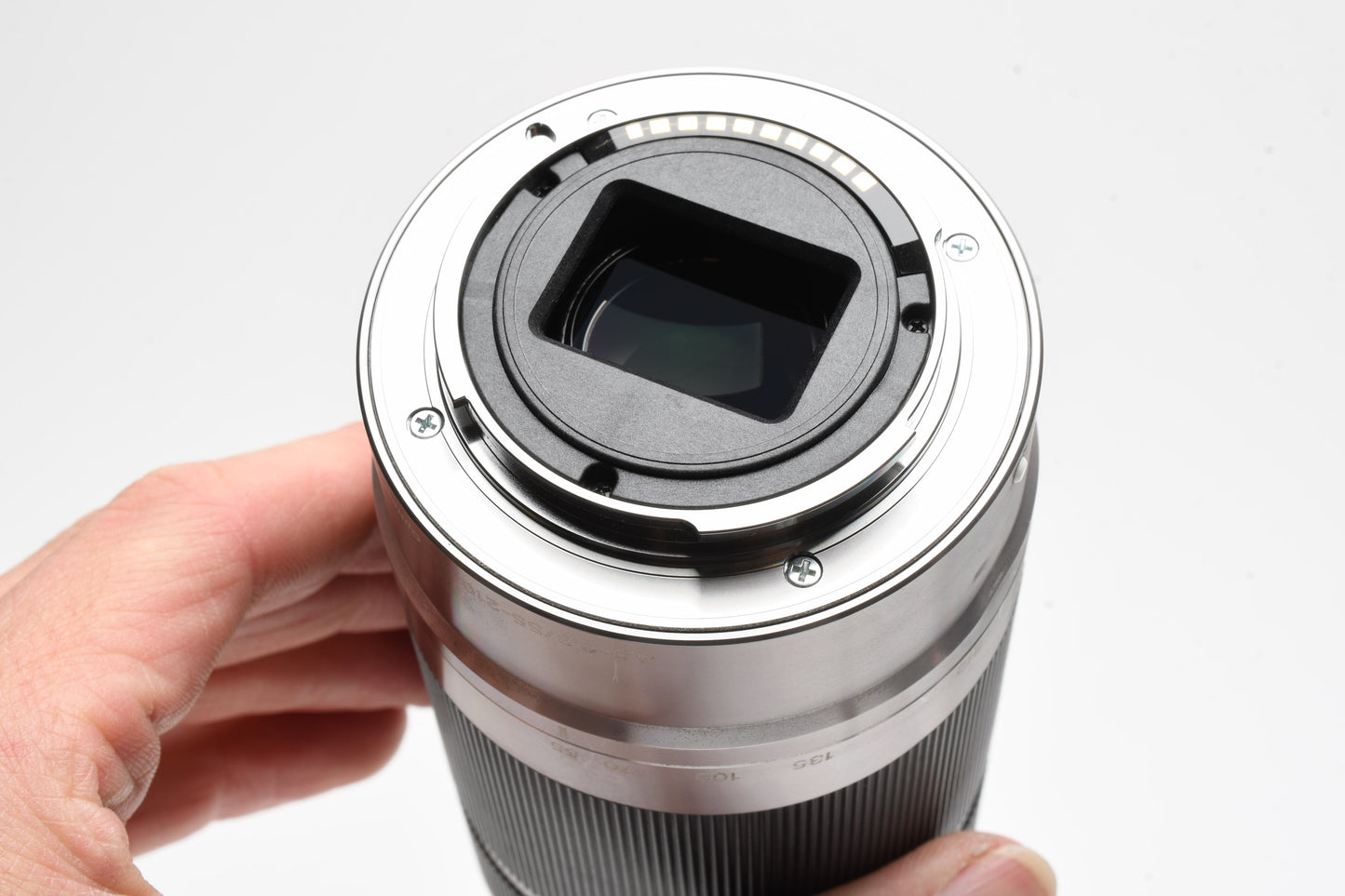 Sony 55-210mm f4.5-6.3 OSS zoom lens (Silver) w/Lens caps, Good!