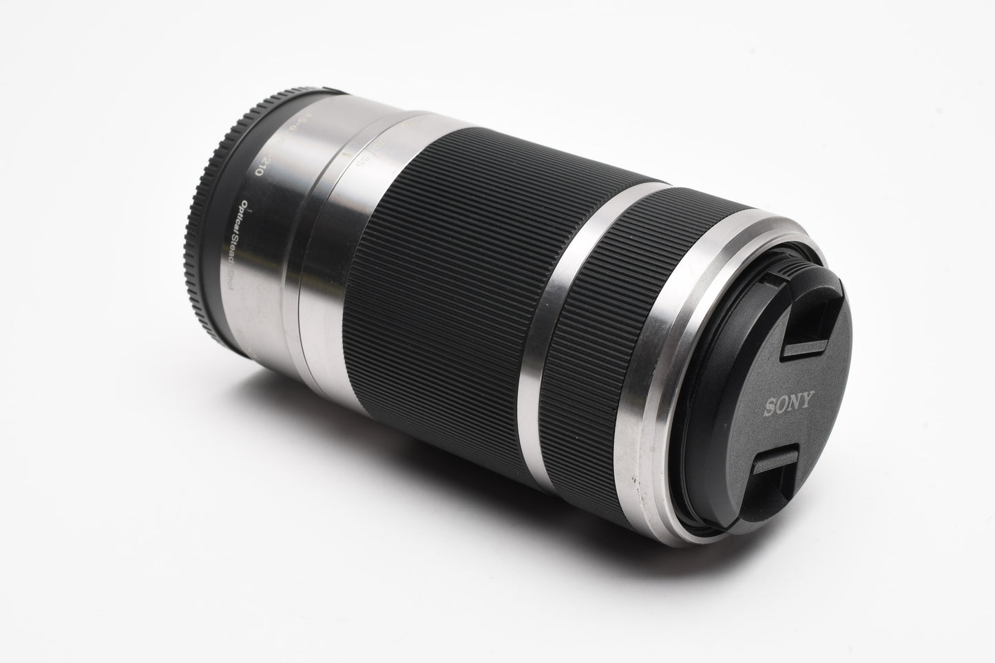 Sony 55-210mm f4.5-6.3 OSS zoom lens (Silver) w/Lens caps, Good!